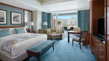 Deluxe room with a private terrace and city views at The Nile Ritz-Carlton Cairo