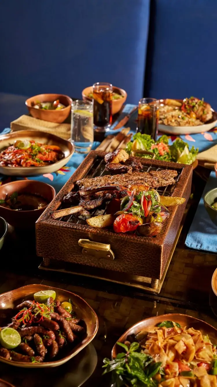 Grilled mezze spread served at The Nile Ritz-Carlton Cairo
