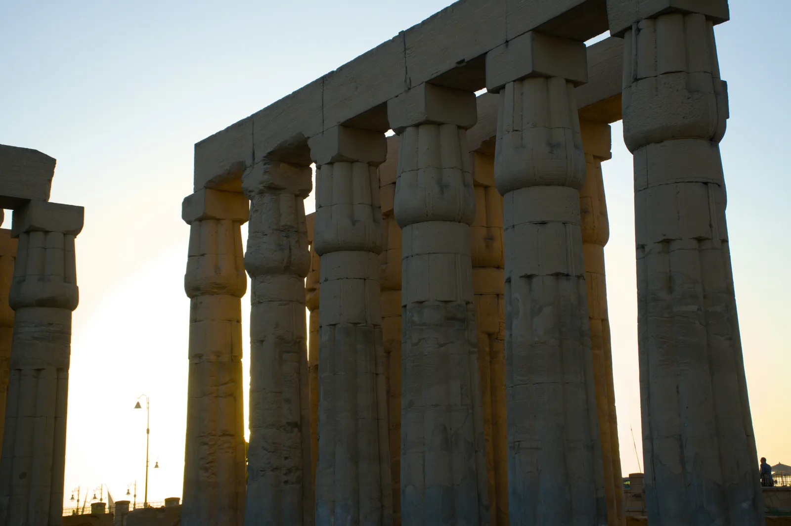 Columns and stone at Luxor Temple at sunset