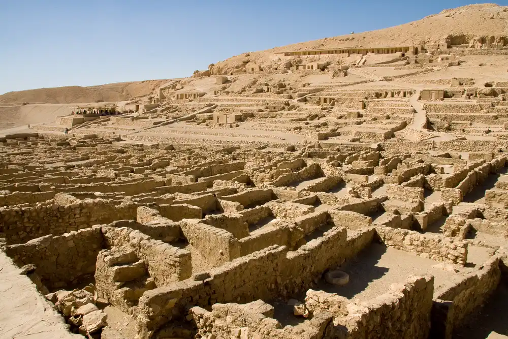 A tomb, ruins and buildings at deir el medina