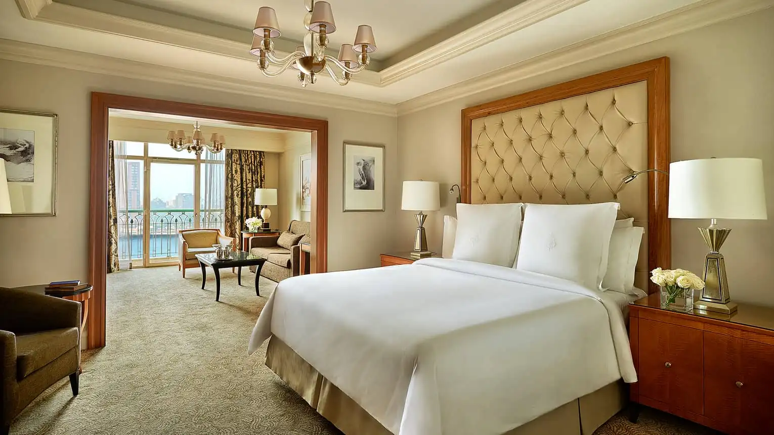 Suite bedroom at Four Seasons Hotel Cairo with a private Nile-view balcony