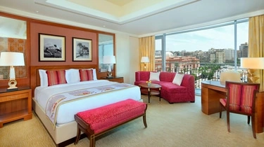 Guest room with city views at The Nile Ritz-Carlton Cairo