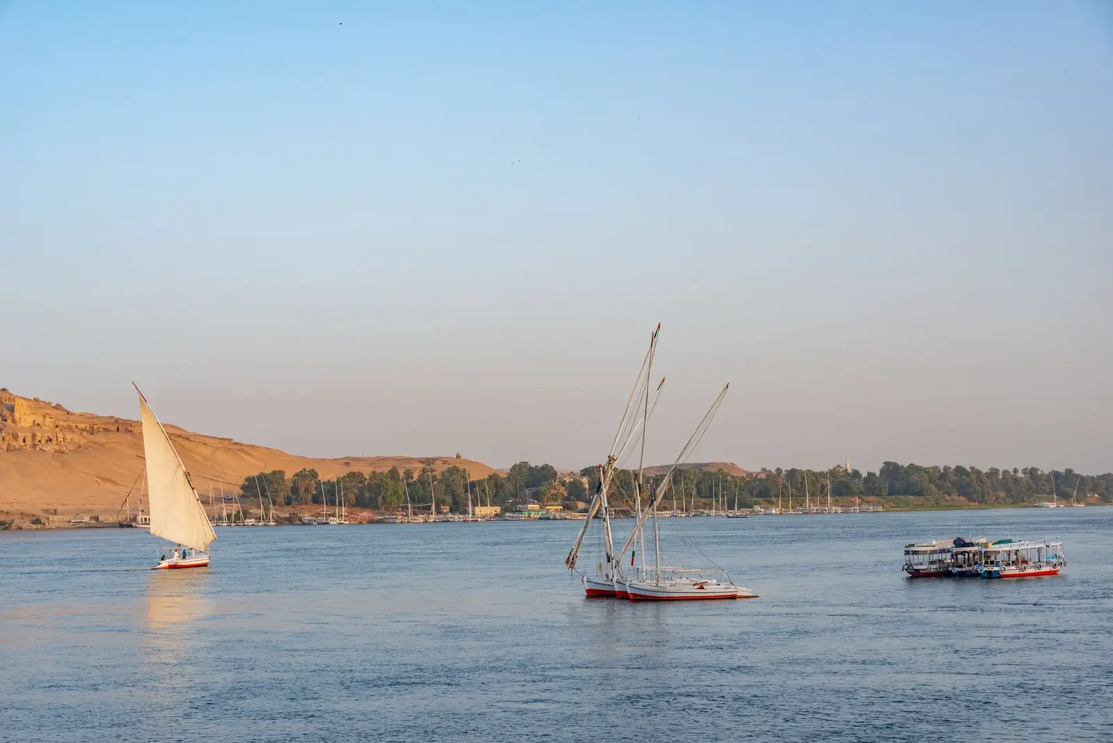Desert sand, a boat and the river among the things to do in aswan