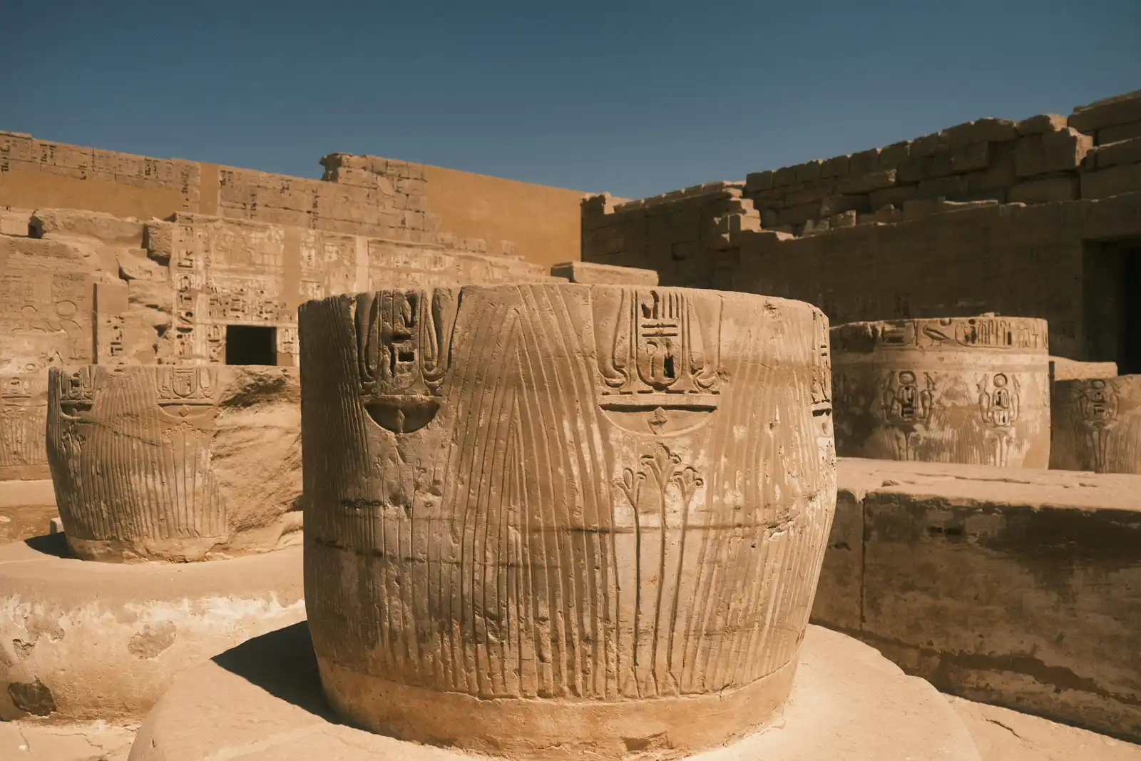 Hieroglyphs, columns and a temple at medinet habu in Luxor