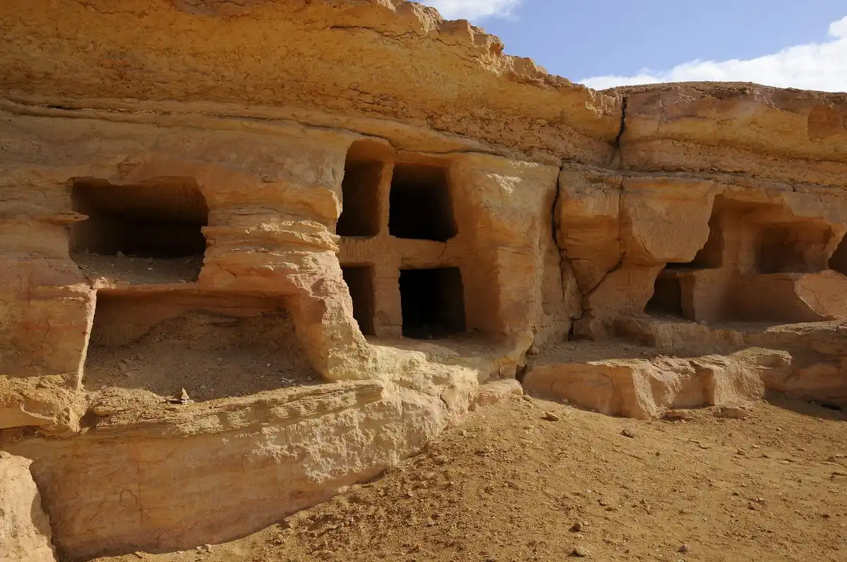 Mountain of the Dead tombs carved into sandstone at Siwa