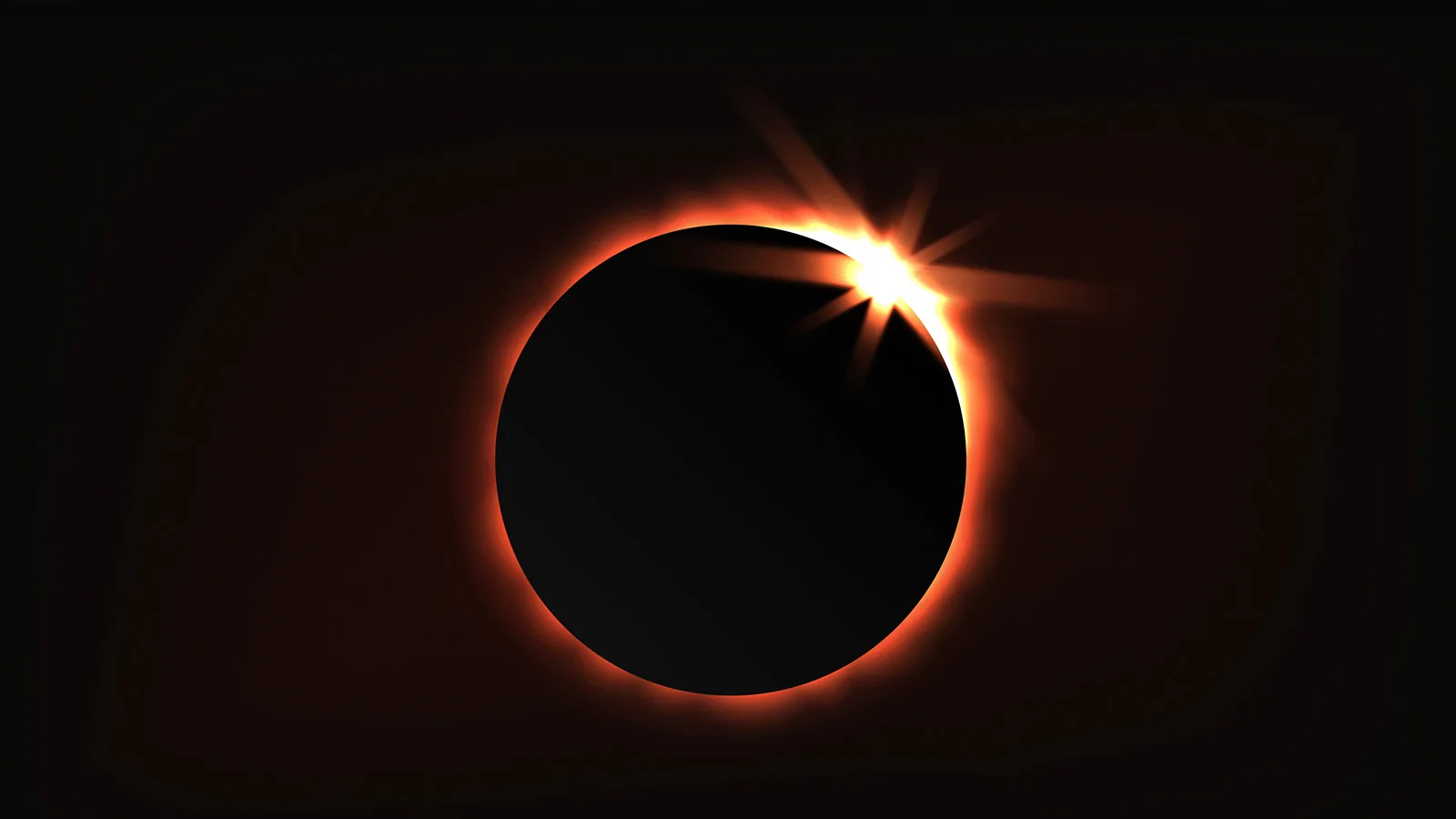 Diamond ring effect at the start of totality, a bright flare on the edge of the moon