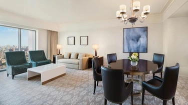 Suite living room with city views at St Regis Hotel Cairo
