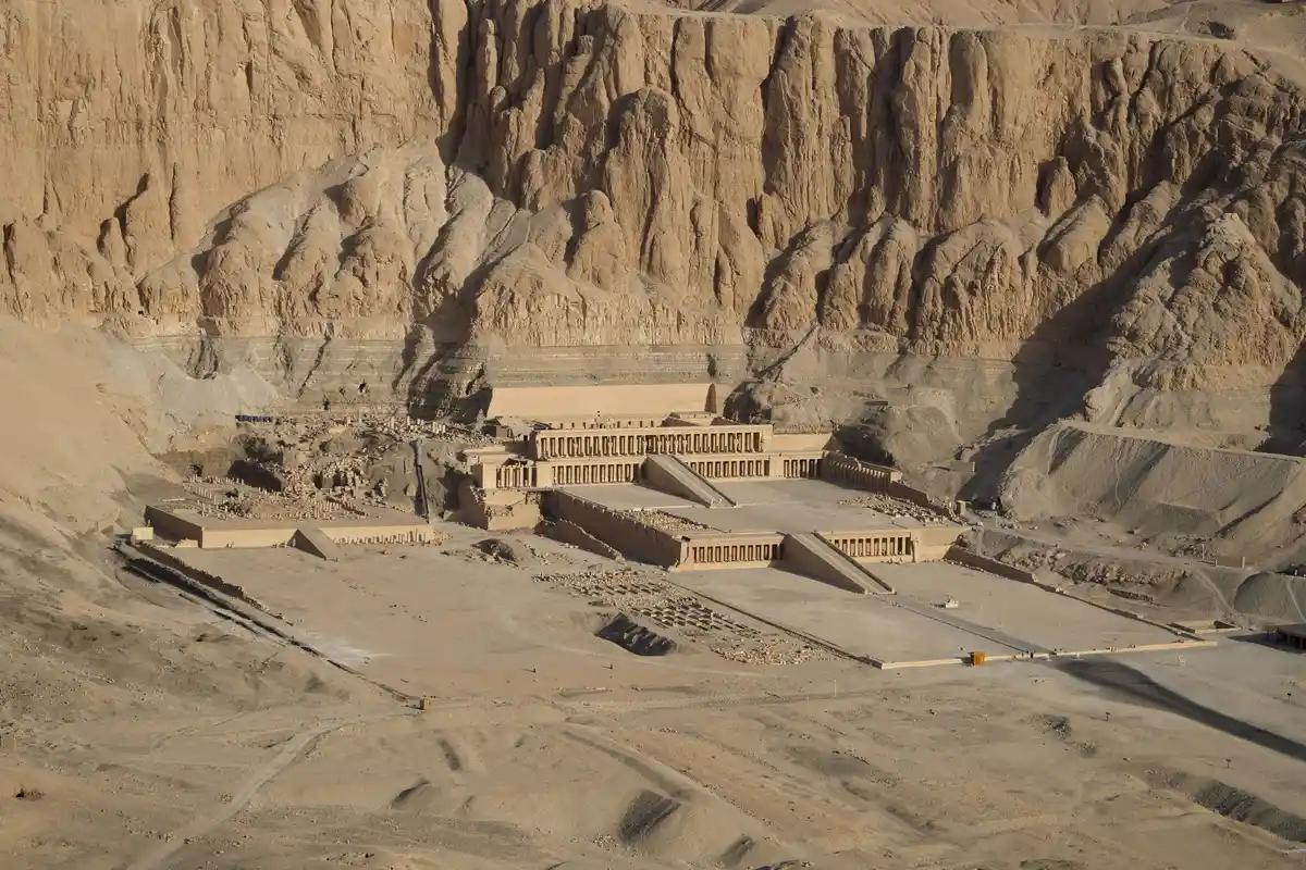 Desert sand and buildings in an aerial view at the hatshepsut temple