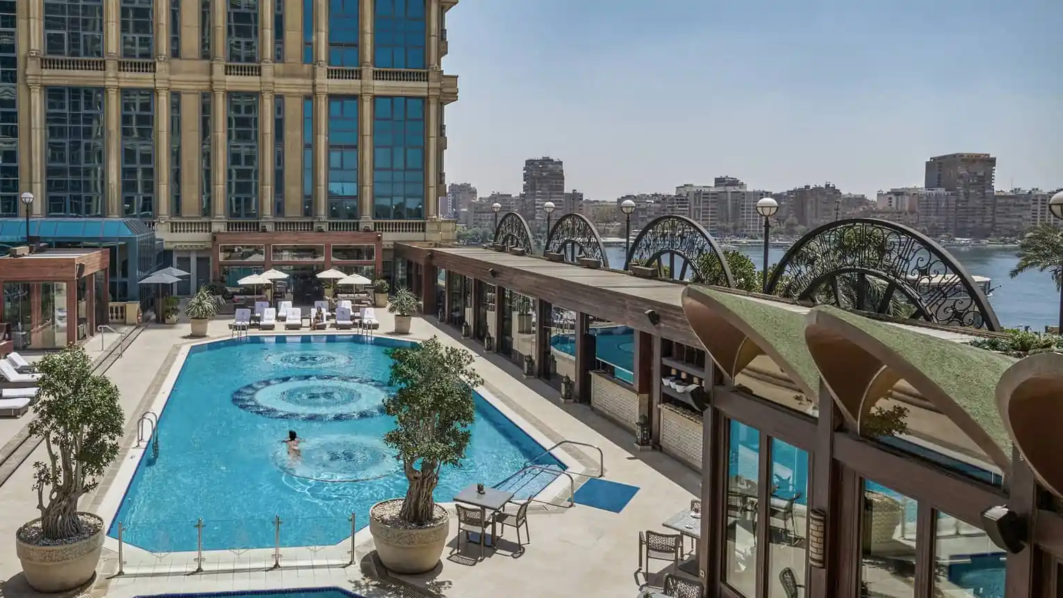 Outdoor pool with Nile River views at Four Seasons Hotel Cairo at The First Residence