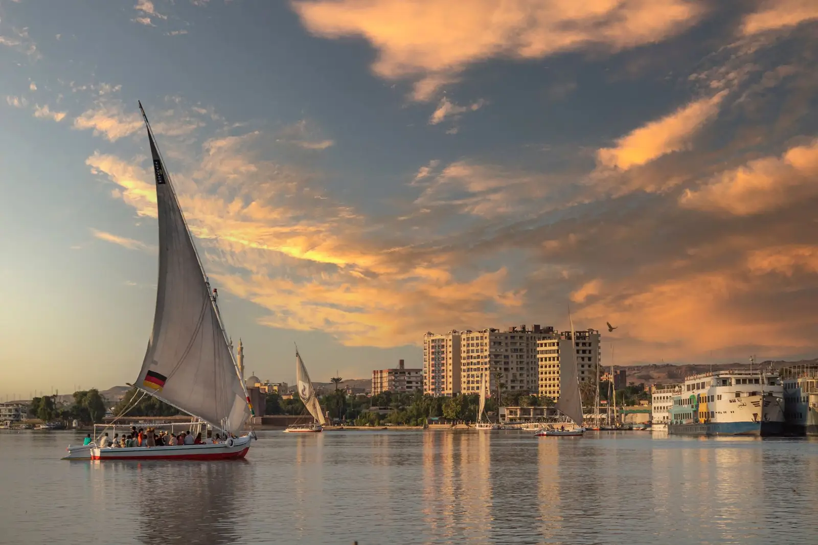 honeymoon in egypt: A boat at Nile River in Luxor at sunset