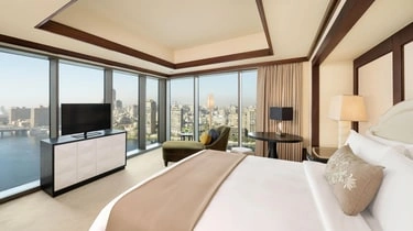 King bedroom with city views at this Nile view hotel in Cairo