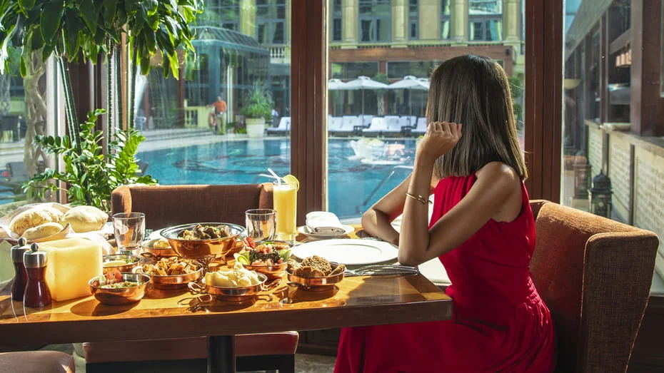 Breakfast spread overlooking the pool at Four Seasons Hotel Cairo at The First Residence