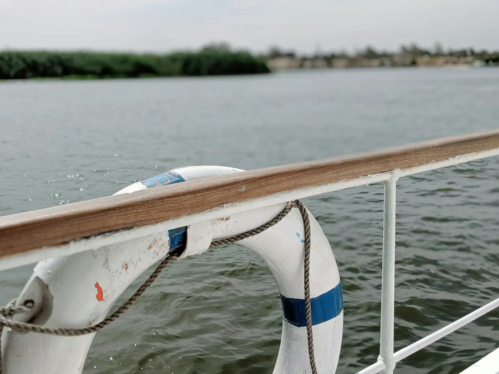 A boat and water at Nile River in Luxor