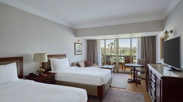Twin guest room at Mena House Hotel Cairo with private balcony