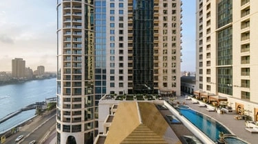 Exterior view of St Regis Cairo, Egypt with the outdoor pool