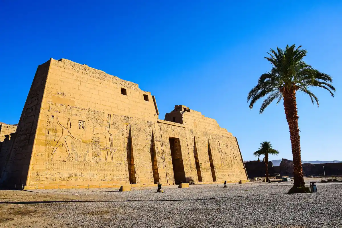 Medinet Habu temple fortified gateway and reliefs in Luxor