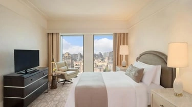 King bedroom with Cairo skyline views at St Regis Hotel Cairo